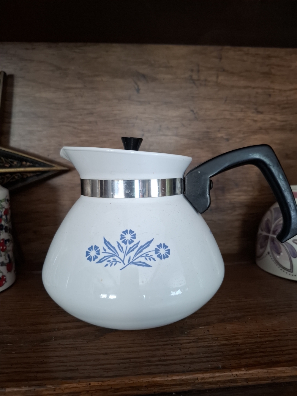 Corningware White Ceramic Coffee Pot with Blue Floral Motif and Black Handle